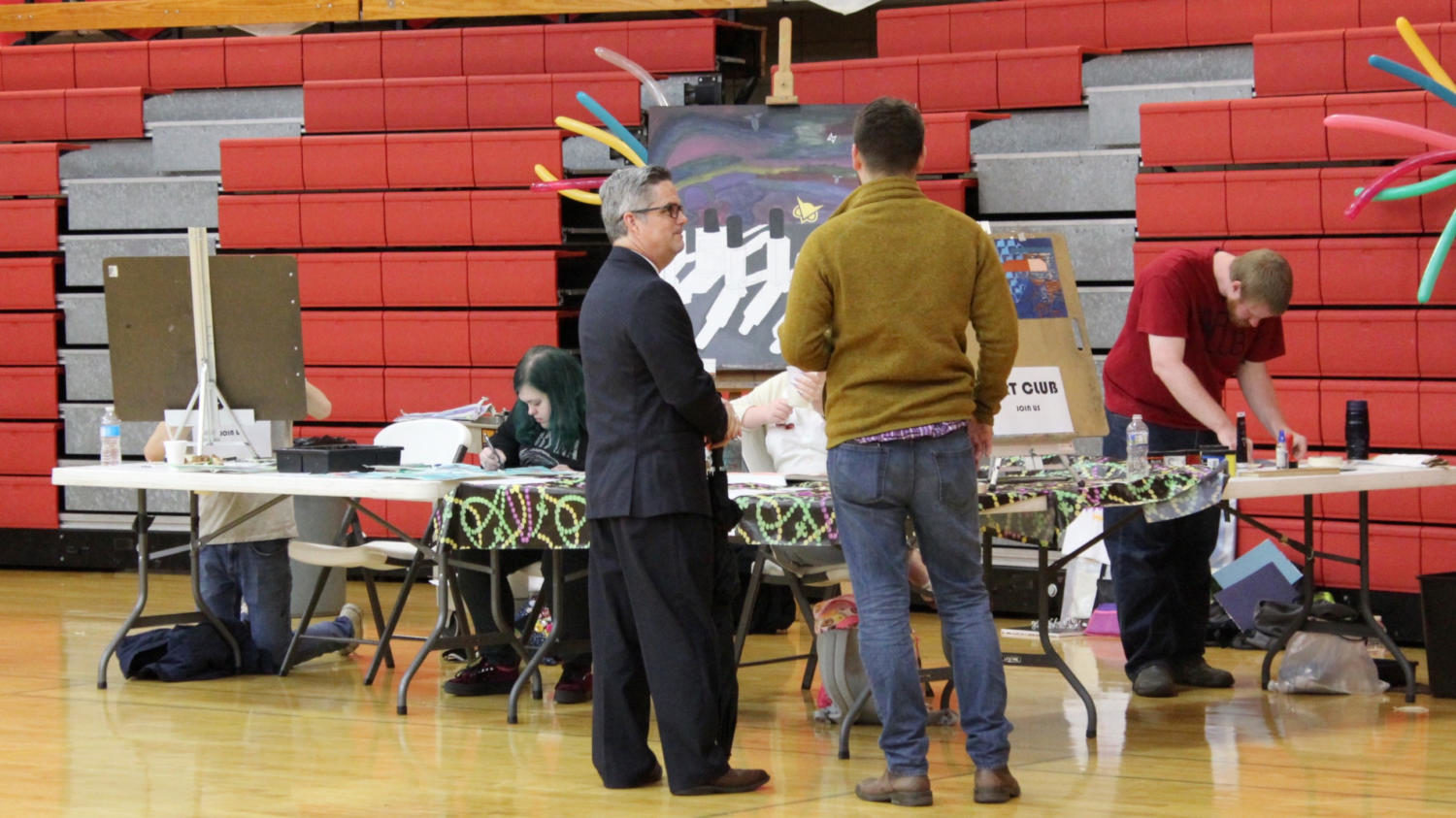 Dr. Bullock visits with the LLC Art Club.