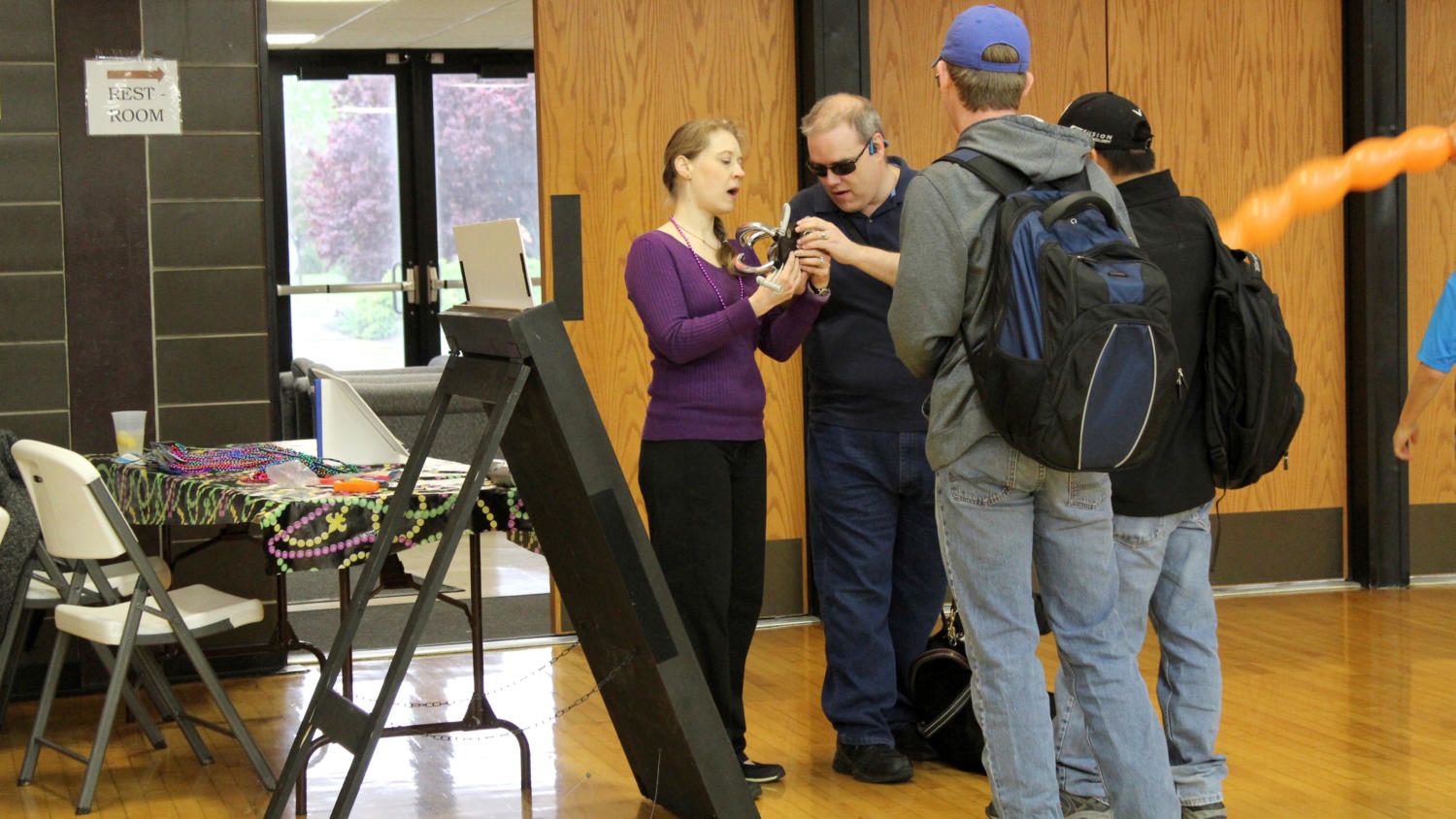 Club IT demonstrates one of their gizmos to student Kelly Prescott.