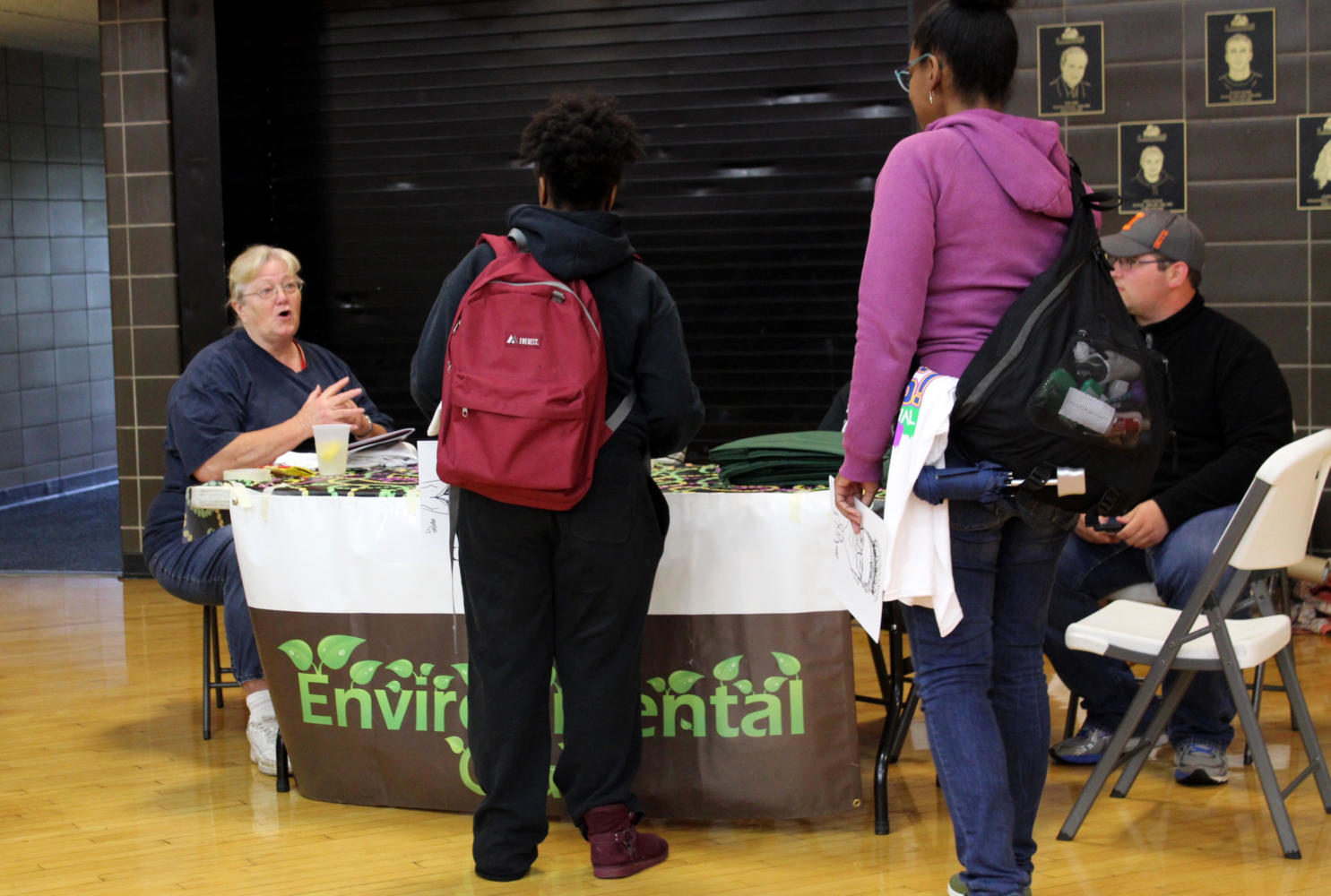 The Enviornmental Club speaks to interested students at the Spring Carnival.