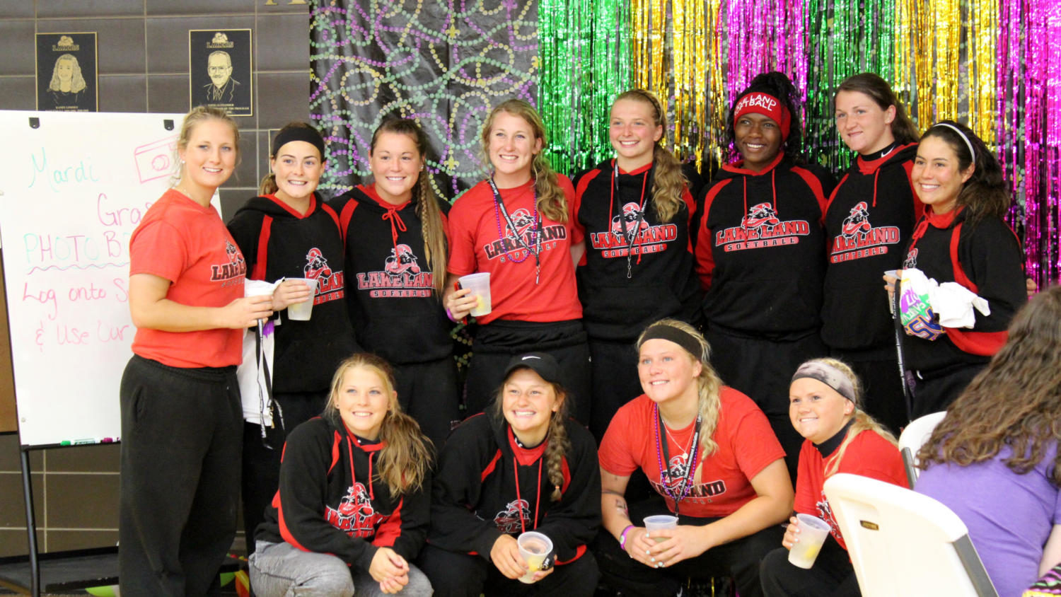 The softball team takes advantage of the Spring Carnival photo booth.