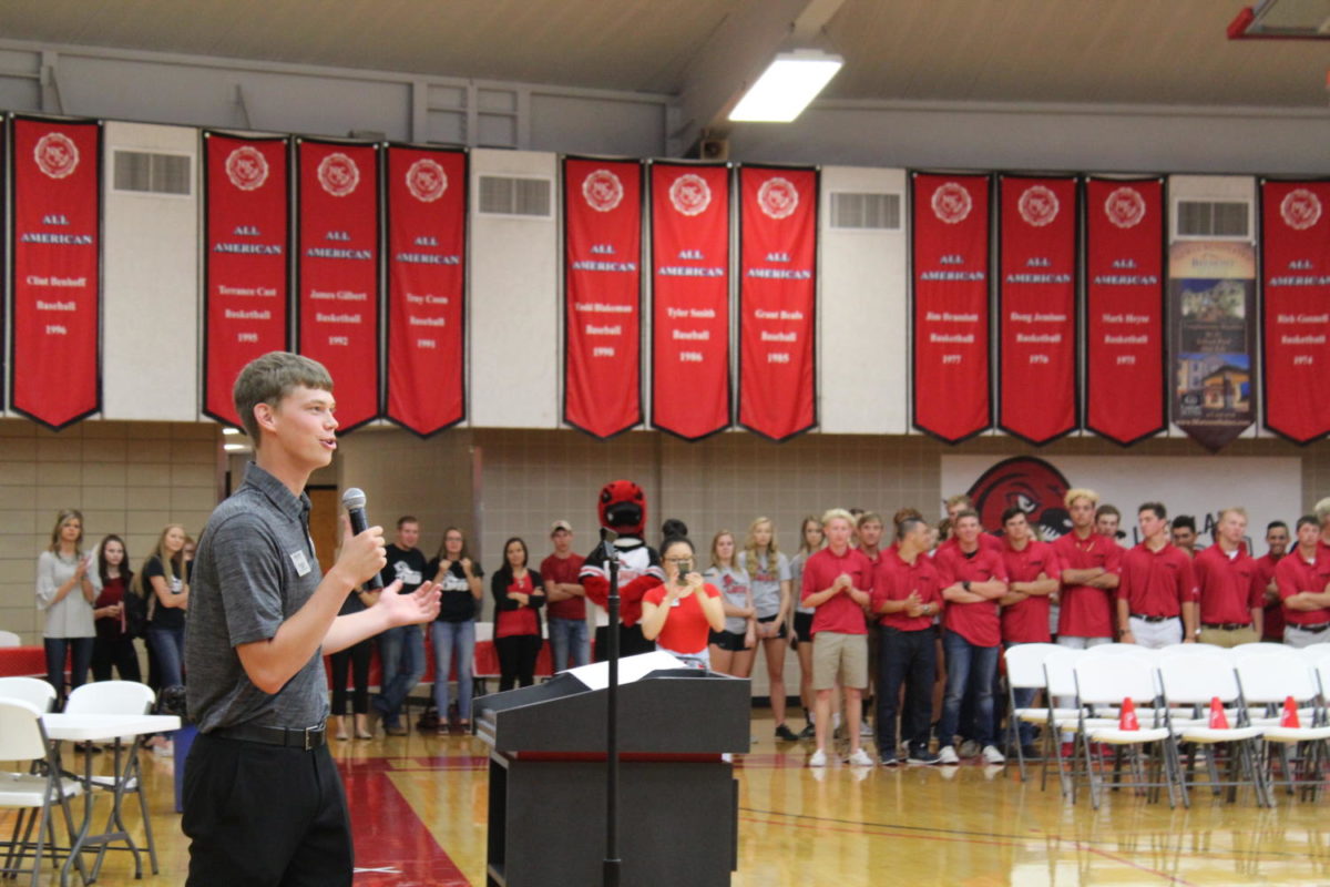 Student Trustee CJ Meaker introduces the Duck Blind to students at the Homecoming pep rally. The Duck Line will be a student section to cheer on Laker athletes.