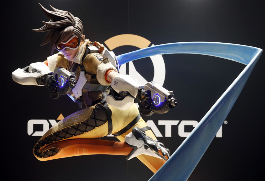 A figurine of Tracer, one of two queer characters in the video game Overwatch
