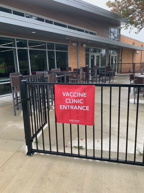 Sign marking the entrance of the vaccine clinic
