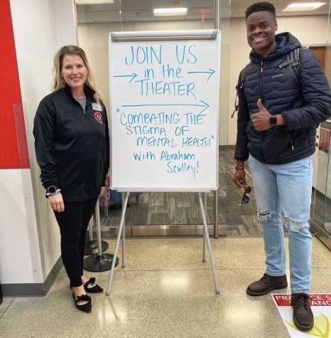 Abraham Sculley poses with Director of Student Life Lisa Shumard-Shelton in the Luthor Student Center. Image retrieved from  Instagram @abrahamsculley.