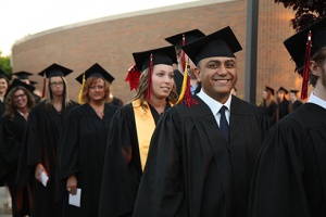 Lake Land College graduates posing before they walk. Photo retrieved from Lake Land College.