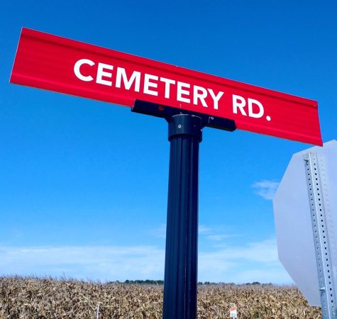 Lake Land Colleges cemetery road sign. This road is located by the Dry Grove Cemetery. Photo via Bailey Farris.​​