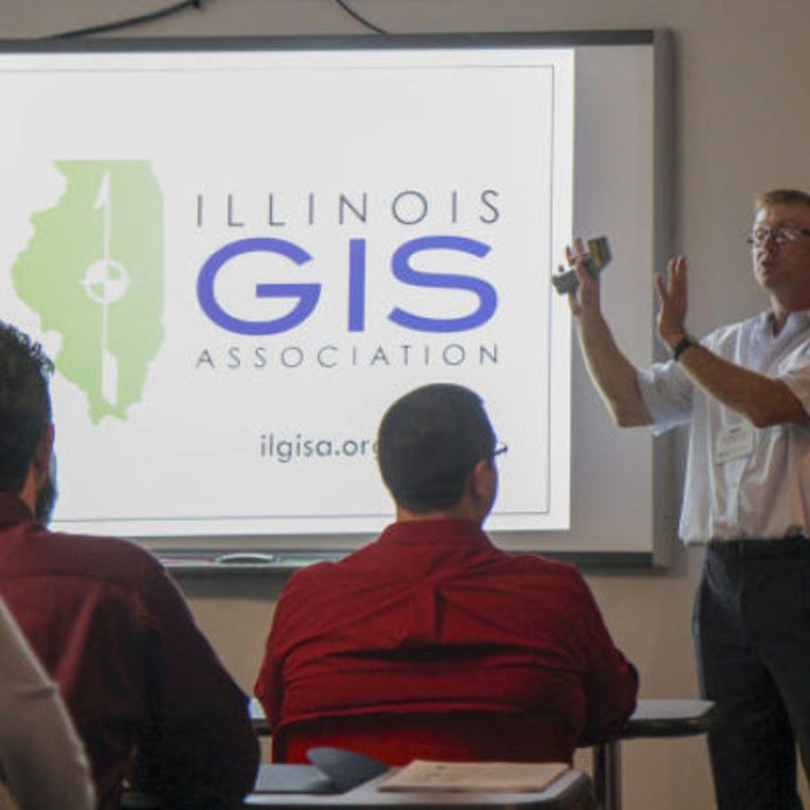 Mike Rudibaugh teaching the GIS course. Photo via Journal Gazette & Times-Courier.​​