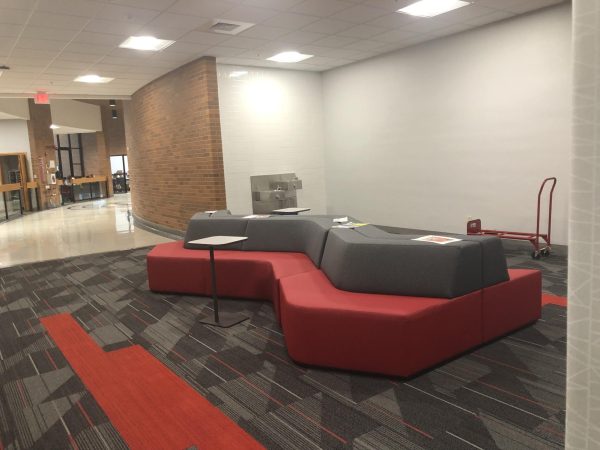 A new set of couches, outside a Neal Hall classroom. Photo by Megan Russell.