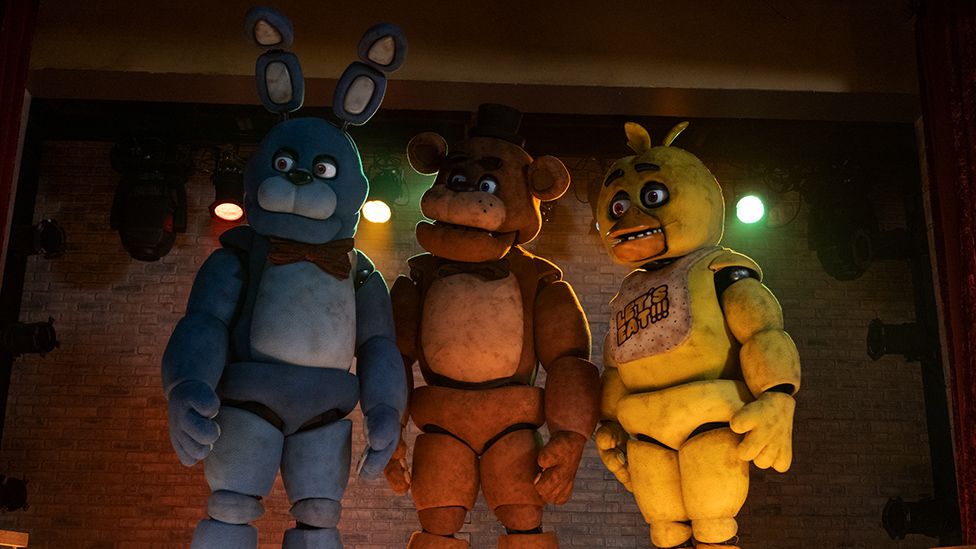 Bonnie, Freddy, and Chica in the film adaptation of the popular video game franchise Five Nights at Freddys. Photo by Blumhouse Productions.