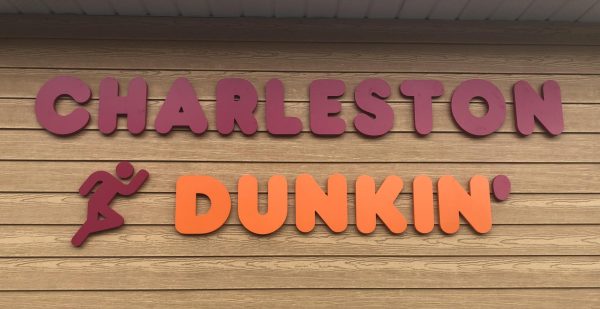 The outside sign of the Charleston Dunkin, this sign faces the drive thru and parking lot. Photo by Megan Russell.