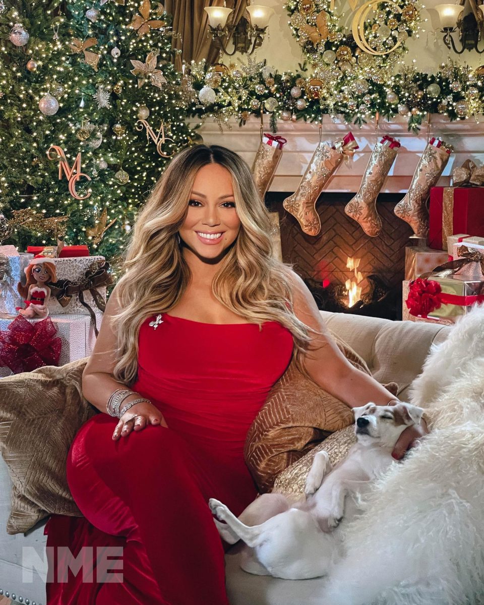 Mariah Carey poses for a Christmas-themed photoshoot to honor her title of “the Queen of Christmas Music.”
Photo by NME via An le.