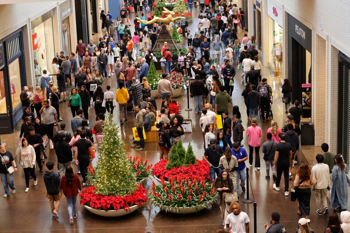 The crowds were out in full force at NorthPark Center on Black Friday, but shoppers there and at other area malls weren’t holding as many bags as in past years. Photo by Chitose Susuki via The Dallas Morning News.