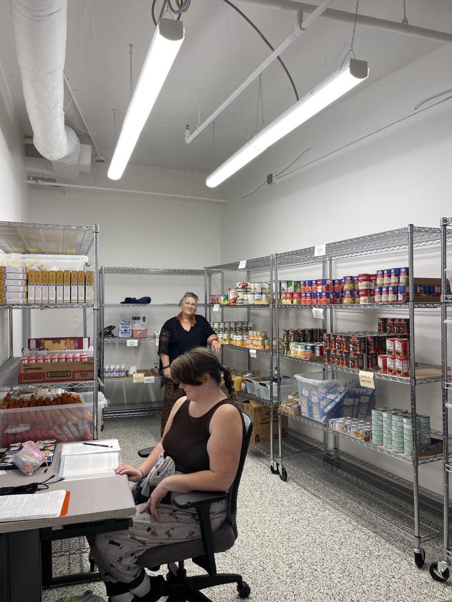 Wally Rubin and student worker in the Lake Land College Food Pantry