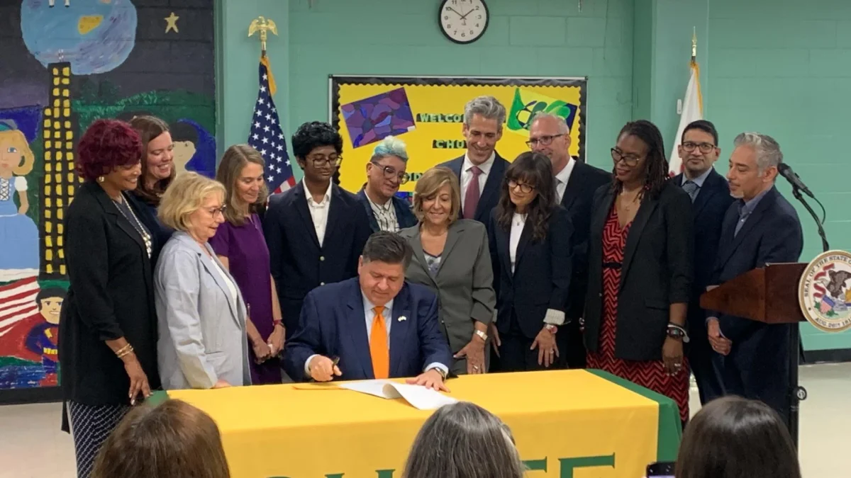 July 31, 2025, Gov. JB Pritzker signs universal mental health screenings into law at Chute Middle School in Evanston Illinois.