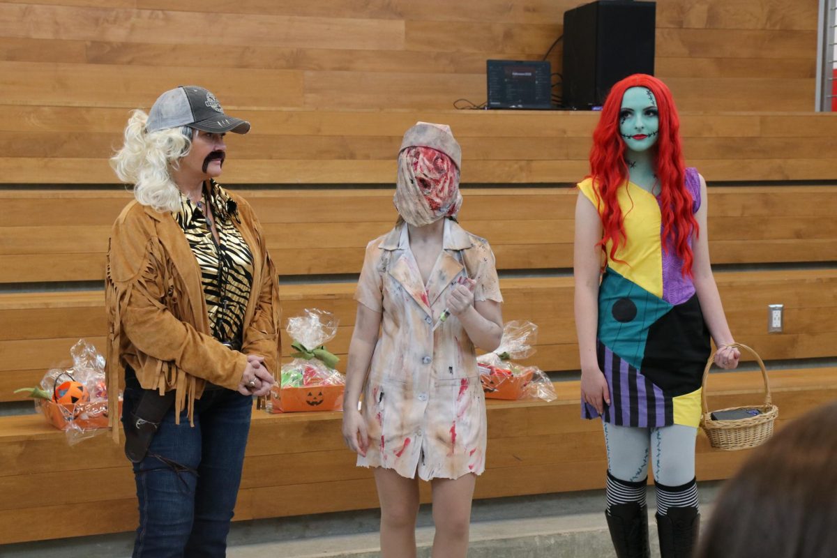 The three winners of Lake Land’s annual costume contest.