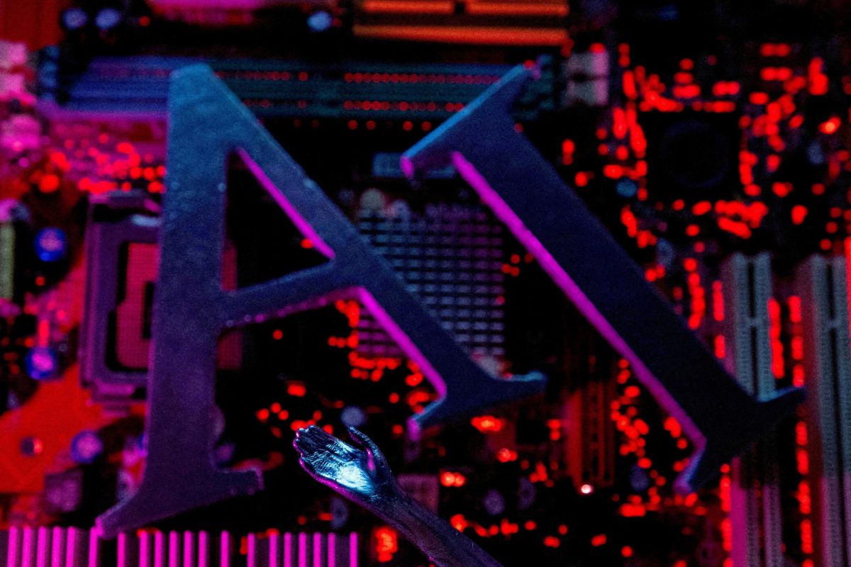 AI (Artificial Intelligence) letters and robot hand are placed on computer motherboard in this illustration created on June 23, 2023. REUTERS/Dado Ruvic/Illustration