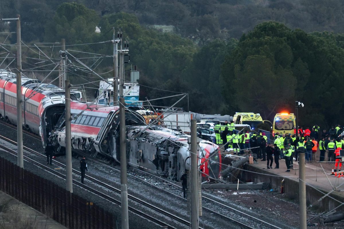 Spanish Civil Guard and emergency personnel working next to the accident near Adamuz.
